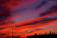 Awesome sunset picture in industrial area with blue, orange and purple sky. Find more cool pictures and wallpapers at FreePhotoCourse.com. © 2011, all rights reserved. 