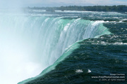 Picture of Niagara Falls taken from the very edge of the falls.  Download free pictures and wallpapers.  © 2011, FreePhotoCourse.com, all rights reserved.  