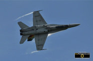 Picture of a CF18 Hornet jet fighter at 90 degree angle, seen from underside of the aircraft. © 2011, FreePhotoCourse.com, all rights reserved.  Free high-res desktop wallpapers and pictures. 