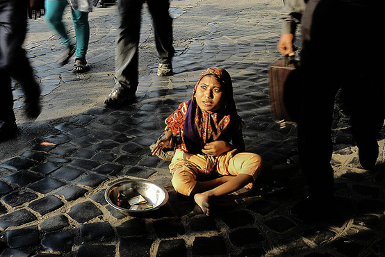 Basic Human Rights Being Ignored.  Picture of a child beggar on the streets of Calcutta, India.  Part of the Photographer Profiles series at FreePhotoCourse.com. © 2010, Soham Gupta, all rights reserved. 