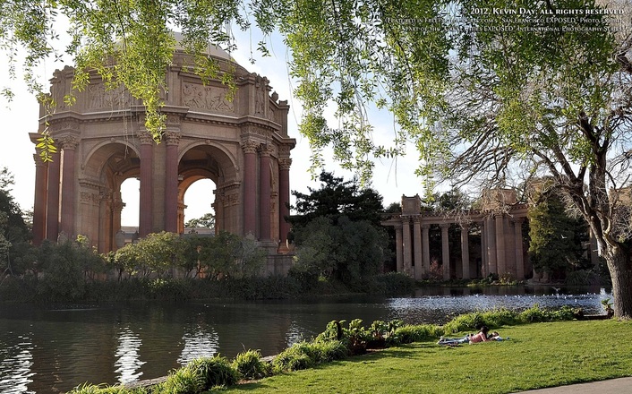 Postcard-like photo of San Francisco's newly restored Palace of Fine Arts, featuring a young couple in love in the foreground. Special Effects picture of the San Francisco skyline in 180 degrees, photographed and created by Steven Shapall. Part of the online artistic photography exhibit, 