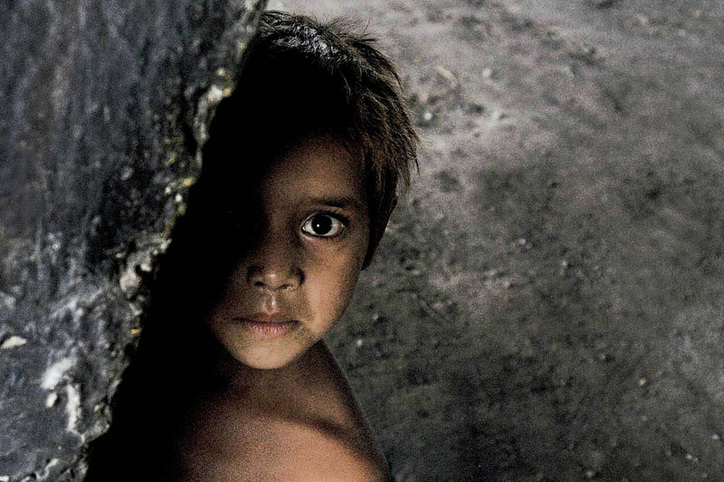 Picture of a young Indian boy that is as beautiful and artistic as it is haunting.  Part of the Photographer Profiles series at FreePhotoCourse.com. © 2010, Soham Gupta, all rights reserved. 