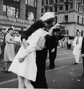 Picture of 'The Kiss' by US Naval  Photojournalist Victor Jorgensen, 1945.  Similar to 'The Kiss' photo by Alfred Eisenstadt that famously appeared in the VJ Day issue of Life Magazine.  Appears in a photography exhibit from www.FreePhotoCourse.com.